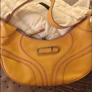 This stylish Charles David purse is one of a kind